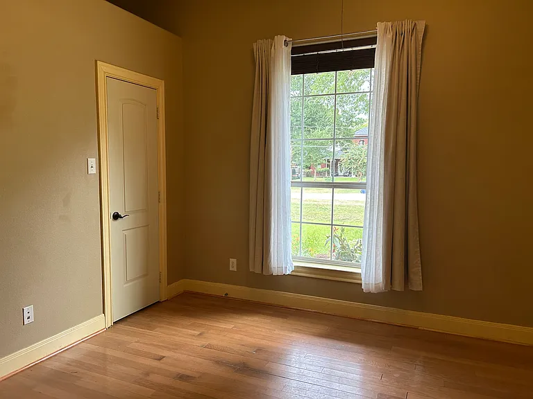 front bedroom with Jack and Jill bathroom connecting it to 3rd bedroom