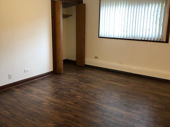 Master bedroom with two closets.