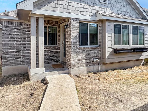 Front of house behind gate! Main entry faces north.