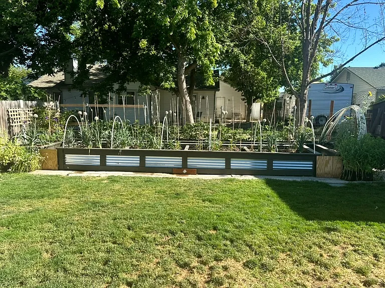 Raised garden beds (two large beds with walkway in-between)