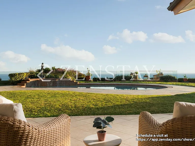 Outdoor seating area ideal for relaxing, dining, and entertaining year-round