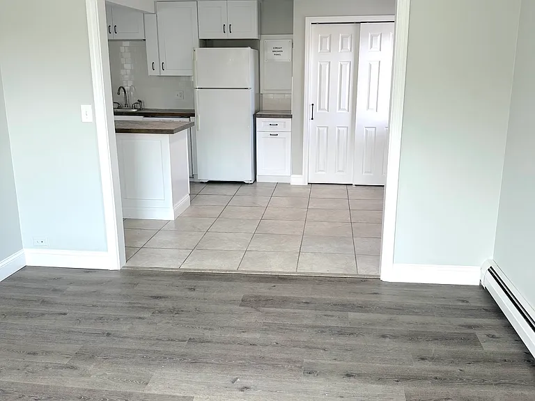 Partial living room and partial dining area
