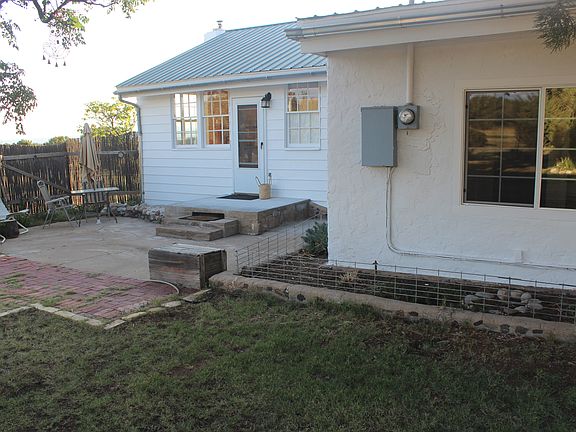 Privacy fenced back patio