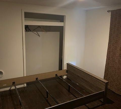 Bedroom - bed frame available for use if needed.