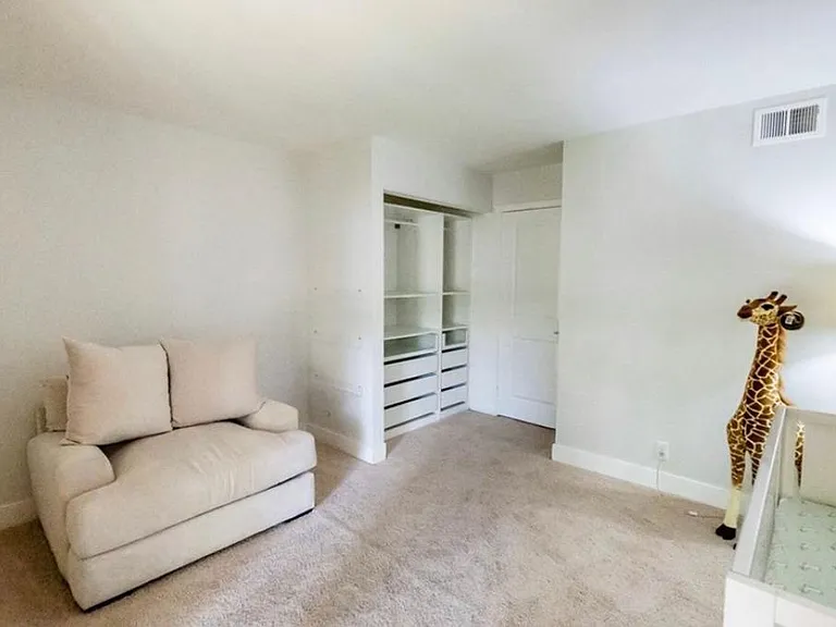 Sliding glass doors and ceiling fan have been installed