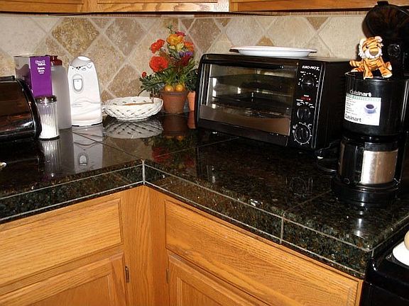 Granite counters and Travertine backsplashh!