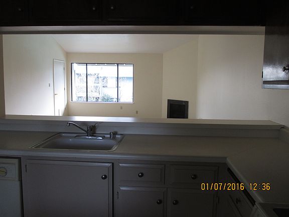 Kitchen overlooks Living Rm