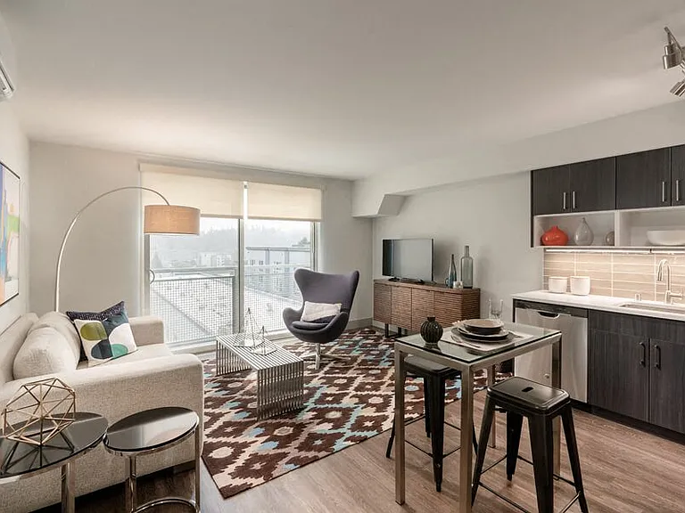 Floor-to-ceiling windows with solar shades in South Building apartments