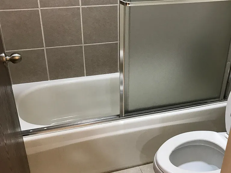 Guest bathroom tub and toilet
