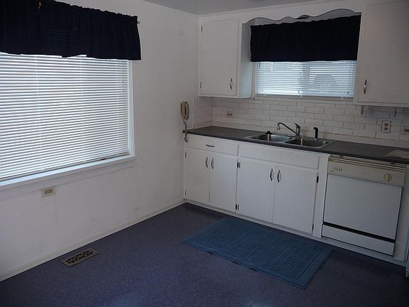 The kitchen has a great eating area and lots up counter space.
