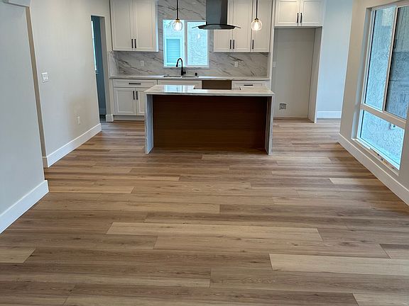 4th image of 7718 S Denker Ave