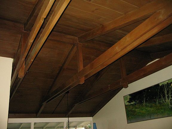Vaulted wood ceiling in living room