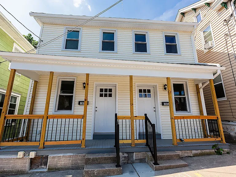 Front of house. 203 is on the left side and 201 is right side of property.