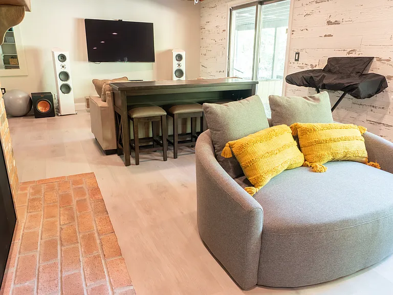 Semi-furnished basement with gas fireplace