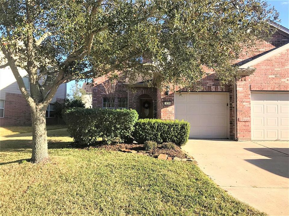 Welcome to 8306 Clover Leaf, where there's luscious greenery and a 3 Car Garage!
