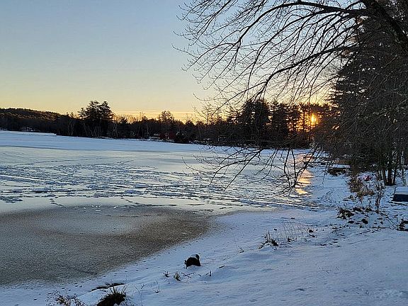 DAYBREAK ON THE POW WOW POND