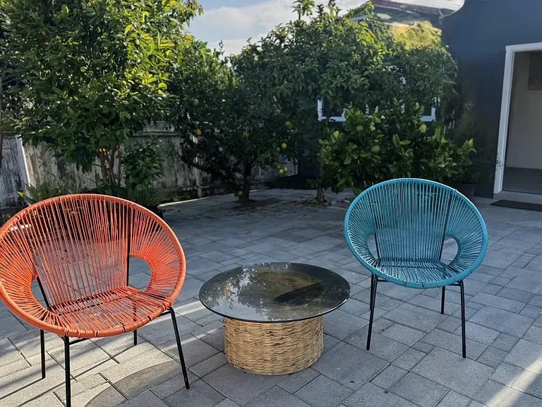 Enjoy the quiet and serene charm of South Redondo Beach by relaxing in the beautiful outdoor shared patio area with fruit trees.