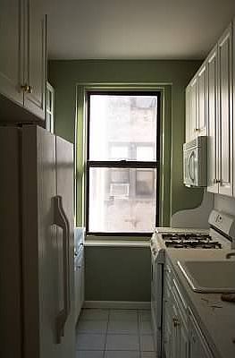 Kitchen photo taken after reno, before new appliances
