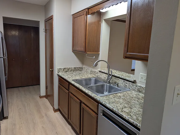 Laundry hookups inside, and off the kitchen. Sizable Pantry and ample kitchen cabinet storage.
