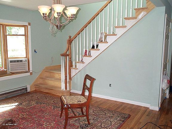 Floors refinished September, 2007; new stairs next to be "finished."