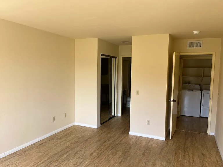 Partial view of on of the master bedrooms; this room is very bright and spacious and has three large closets