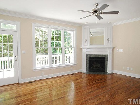 The Family Room has a Porcelain Surround, Gas Log Fireplace with Fluted Trim, Decorative Mantle, Bui