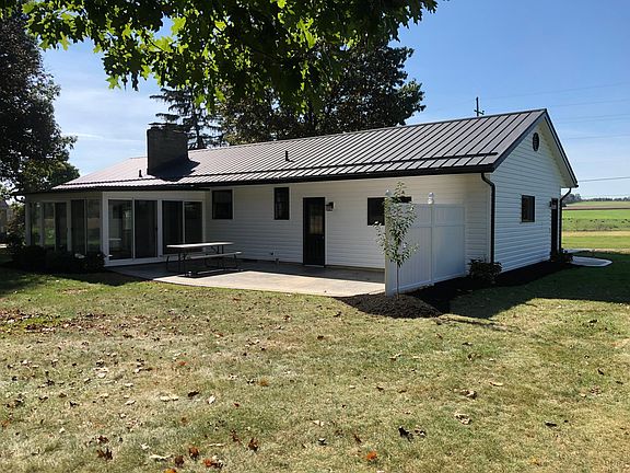 Stamped concrete patio & 3 season room