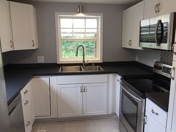New SS sink, faucet and countertop