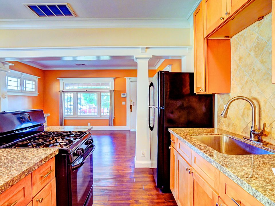 1st image of 1247 W 37th Dr #4B-4Ba-1403Sqft