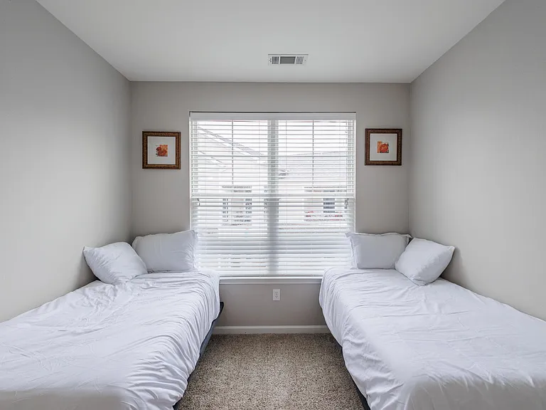 bedroom three with two adjustable twin beds