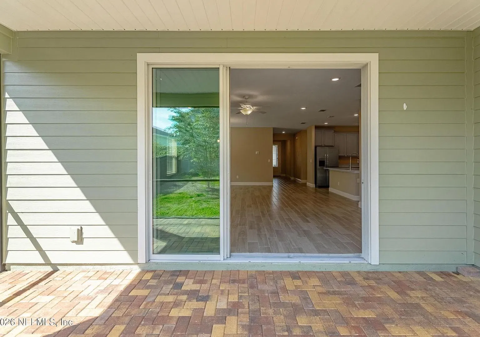 Spacious 4-Bedroom Home in Shearwater with Fenced Backyard & Screened Lanai — Photo 3