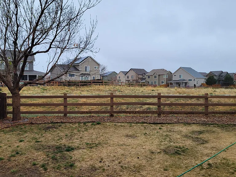 Private fenced yard that backs to Open Space.