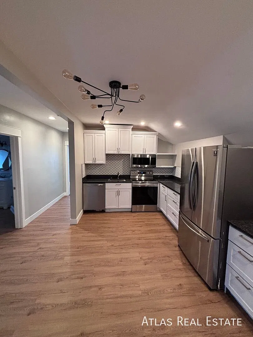 Welcome home to this inviting 1-bedroom, 1-bath apartment at 4415 S Broadway #1! — Photo 3