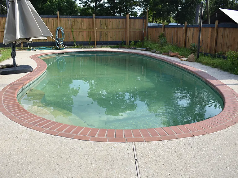 13925 Calhoun Rd — Photo 2