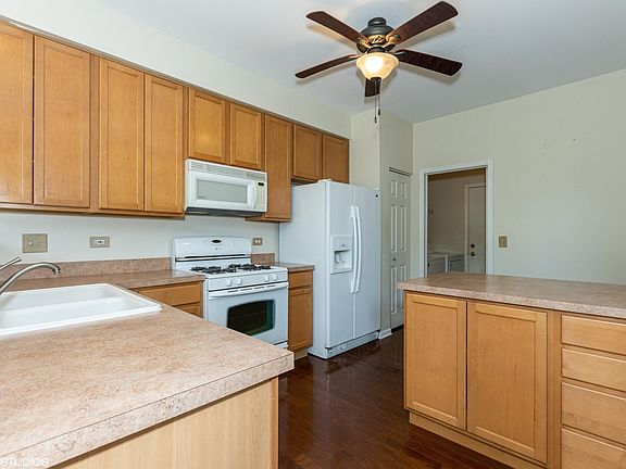 Kitchen with plenty of storage, plus a breakfast bar!