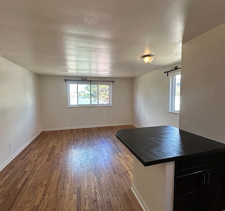 living room and kitchen peninsula