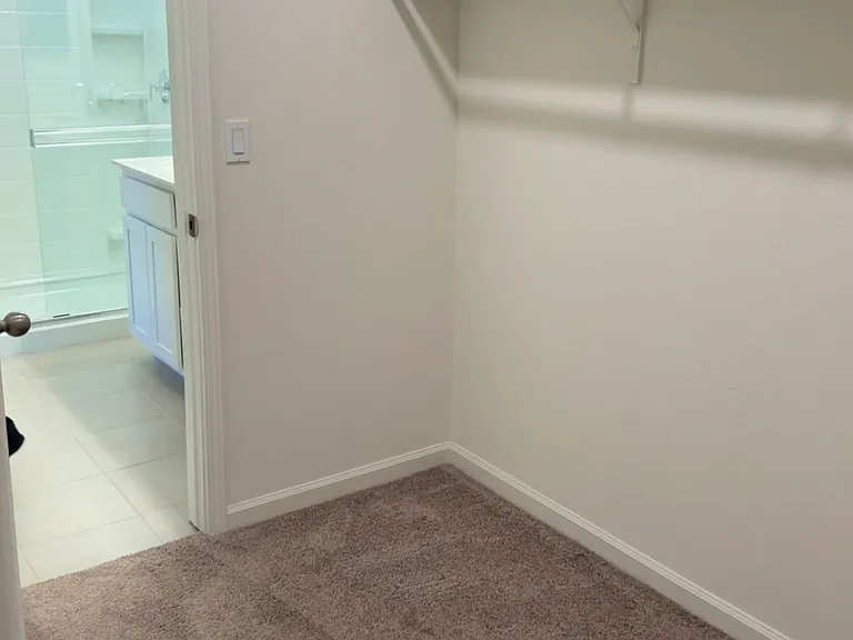Master bedroom walk in closet