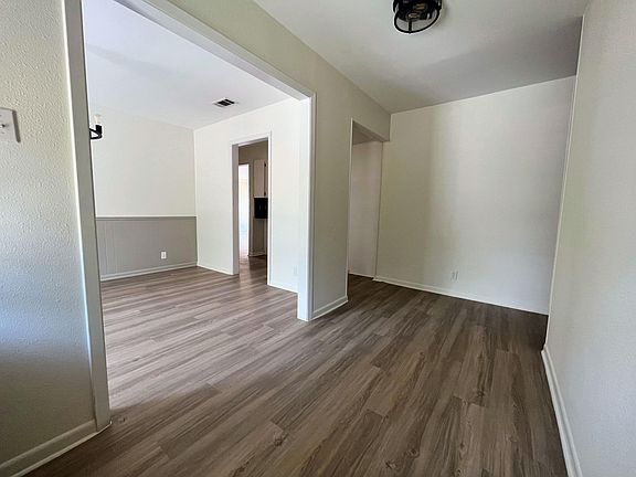 Foyer with formal dining room to the left