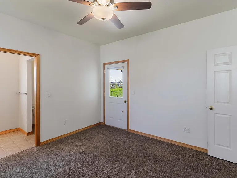 Master Bedroom bathroom and private entry to the back patio.