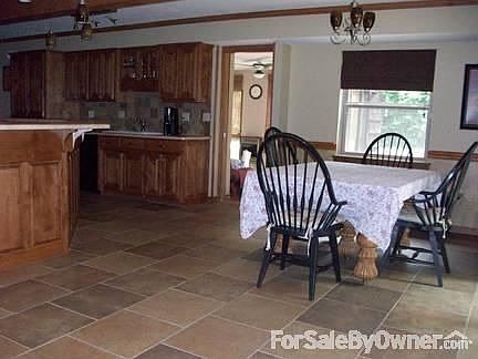 Kitchen : Eating Bar and kitchen table open to kitchen.
