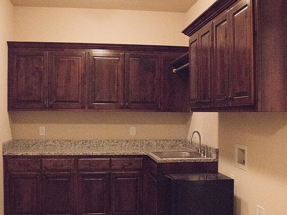 Laundry connects to closet 