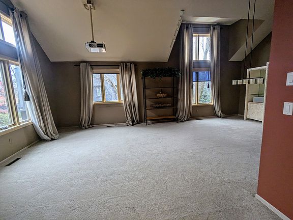 Living room with 16ft. vaulted ceiling and overhead TV projector