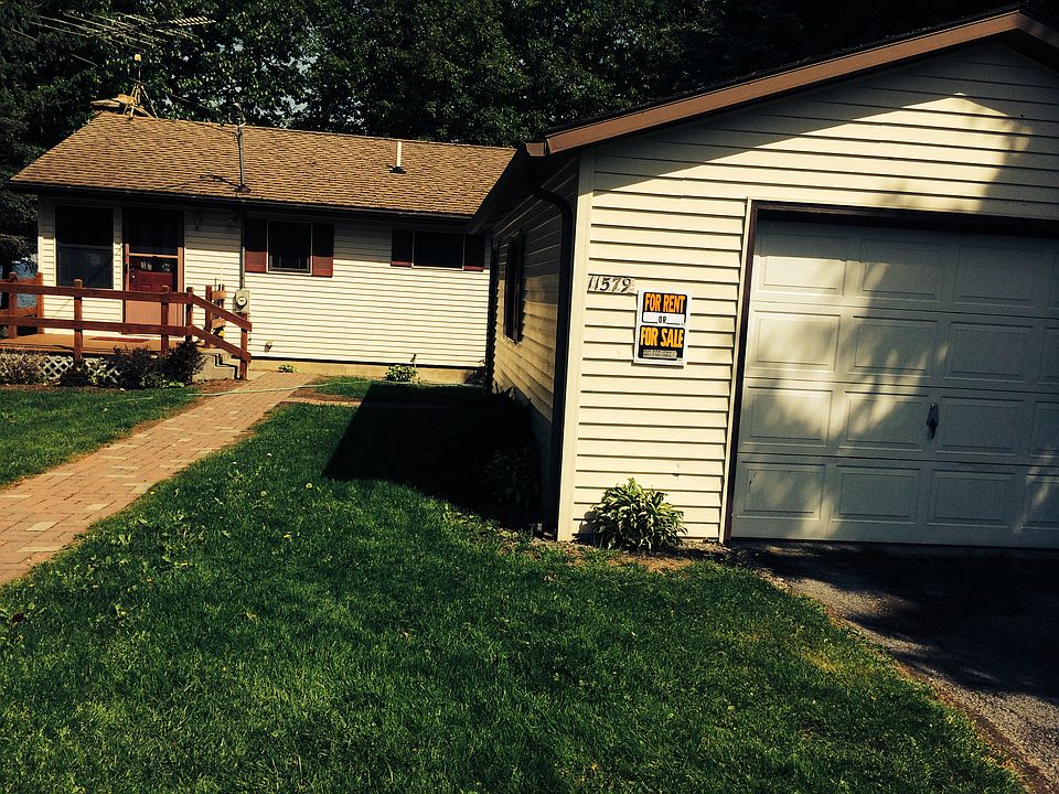 Back of house with detached 