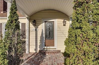 All the charm greets your guest onto a covered front porch. Brick stoop & leaded glass door