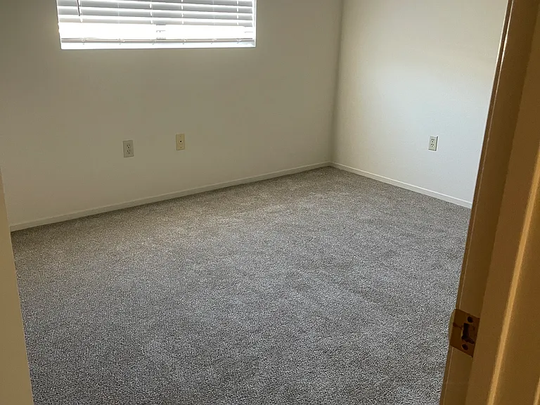 ANOTHER VIEW SECOND BEDROOM
WITH NEW CARPETING AND BLINDS