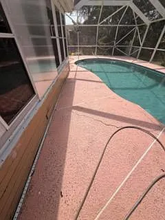 Screened-in pool deck with ample patio space for lounging and outdoor enjoyment.