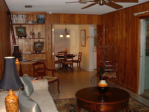 Cozy Family room with built in bookshelves.