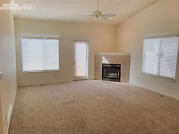Living Room has a walkout to the deck and a gas fireplace