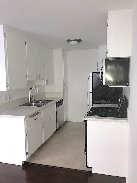 Look at all of that cabinet space! Dishwasher also included. 

*Model unit-available unit may defer slightly*