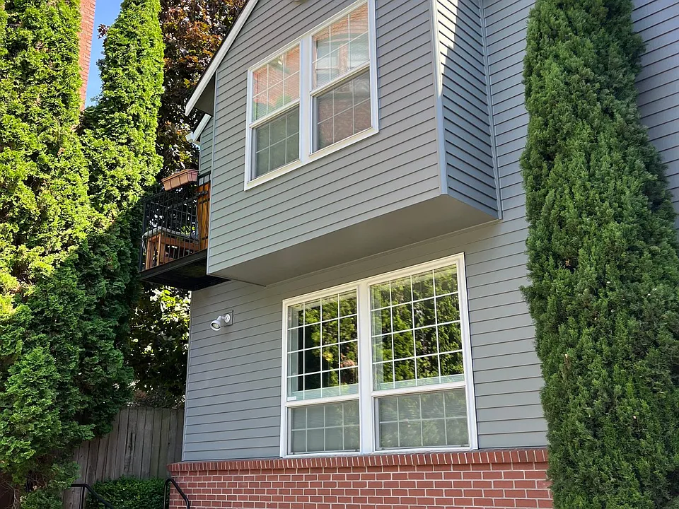 two story townhouse corner unit, set back from street